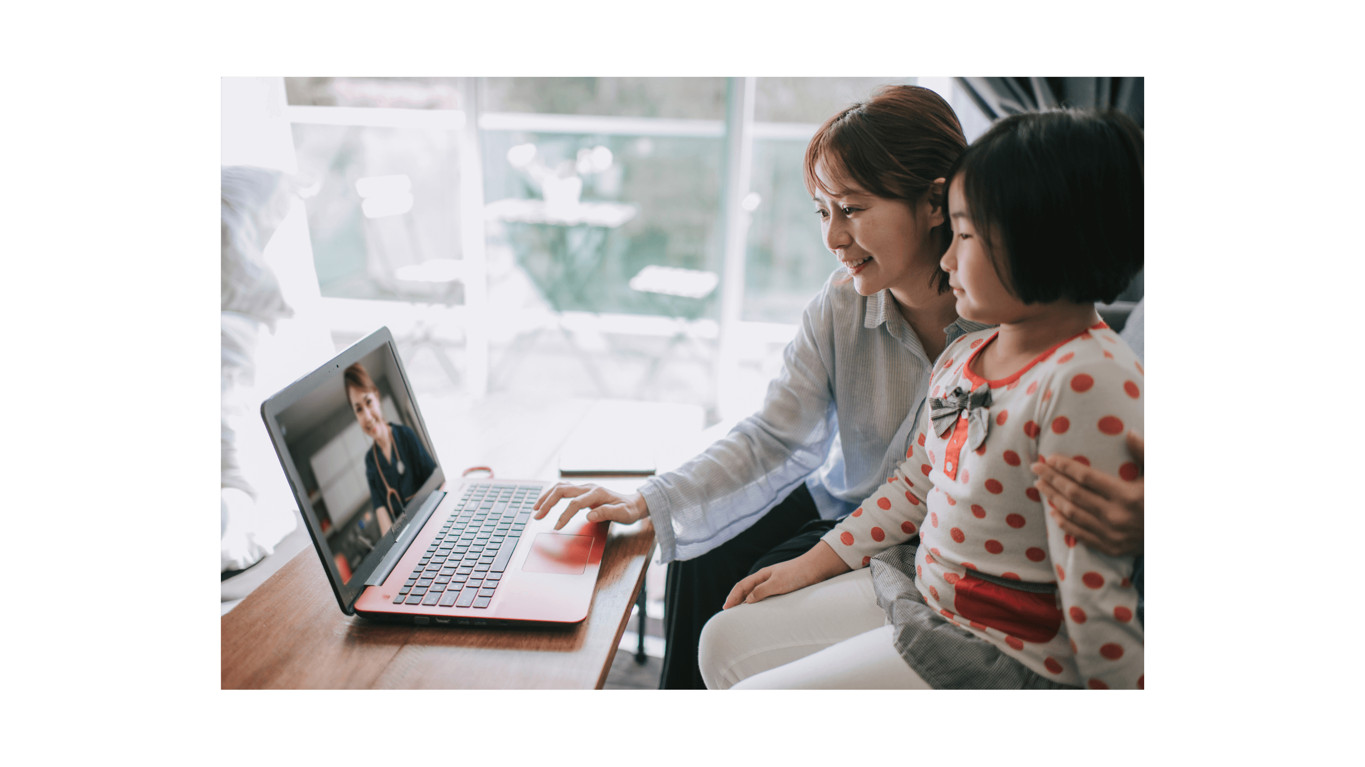 Parent and child meeting with an educator over video